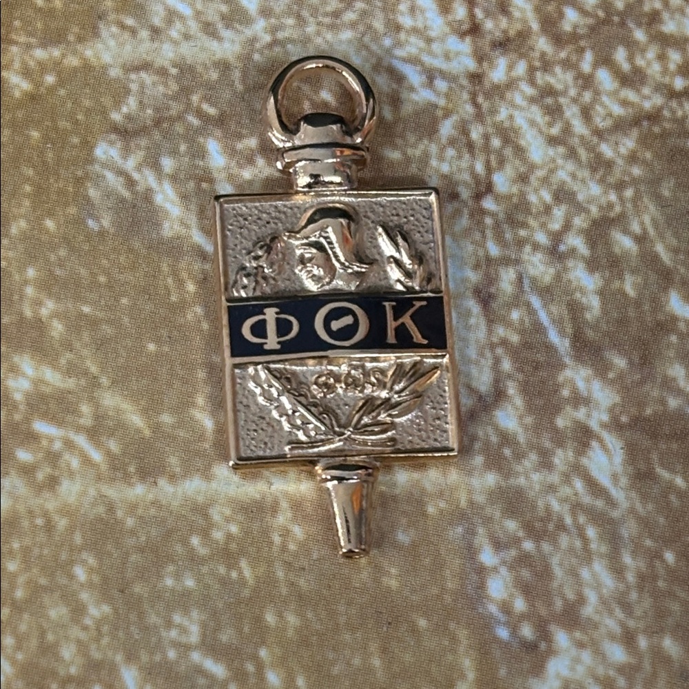 Phi Theta Kappa honor society gold pin